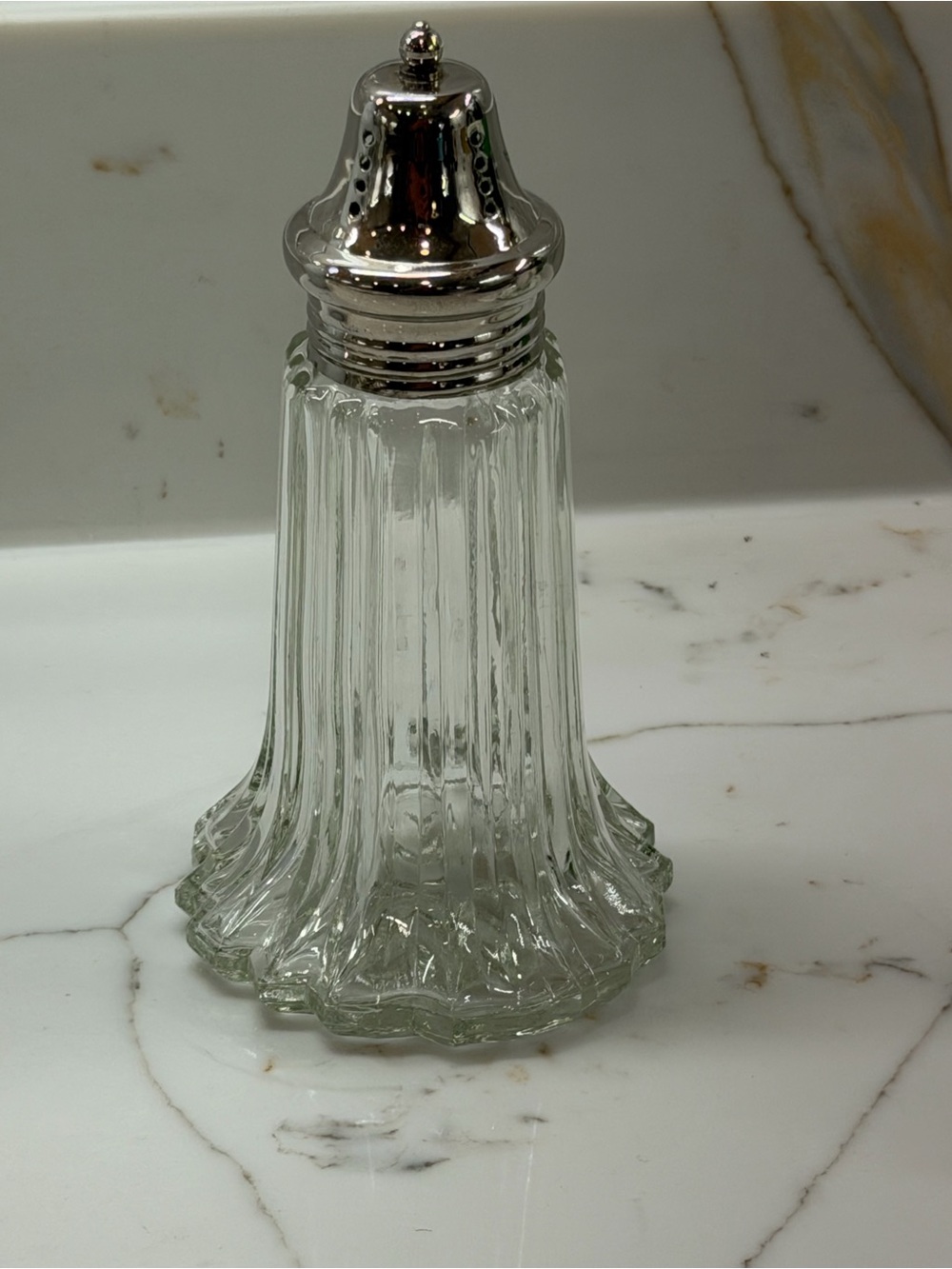 Pressed glass sugar shaker Muffineer with starburst base &silver lid.